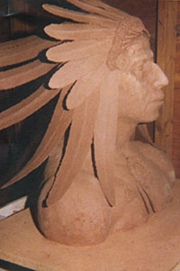 sculpture by Dan Skinner stone and metal sculptor